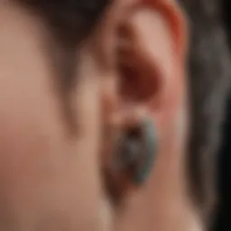Close-up illustration of an ear with sound waves emanating